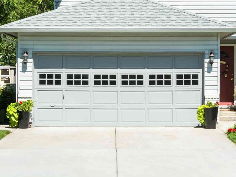 Featured image for “Choosing the Best Garage Door Material: Pros and Cons of 4 Common Materials”